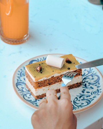 "Layered Cake Slice on a Fancy Plate"の写真素材