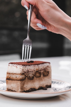 Colorful Fruit Topped Cake on White Backgroundの写真素材