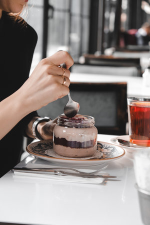 Very delicious dessert in jars, sweet and cakes in jarsの写真素材