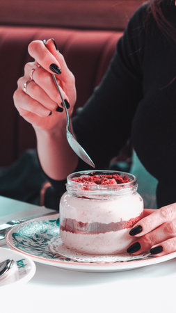 Very delicious dessert in jars, sweet and cakes in jarsの写真素材