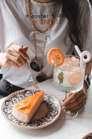 Elegant Layered Cake on a Rustic Wooden Tableの写真素材
