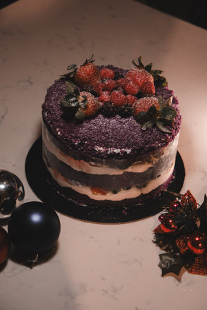 Festive Celebration Cake with Candlesの写真素材