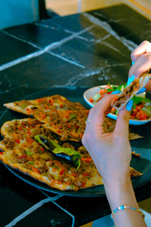 Turkish pizza pita with a different stuffing.の写真素材