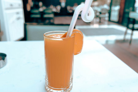 A glass of tasty orange juiceの写真素材