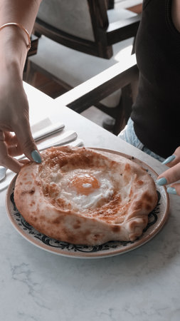 Turkish pizza pita with a different stuffing.の写真素材