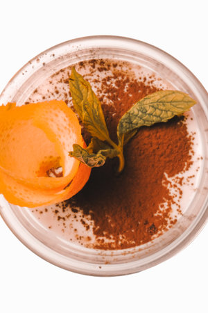 Delicious profiteroles with chocolate on the tableの写真素材