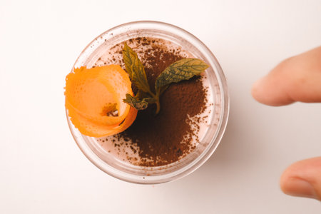 Delicious profiteroles with chocolate on the tableの写真素材