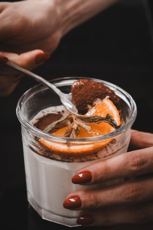 Delicious chocolate dessert with cream on the tableの写真素材