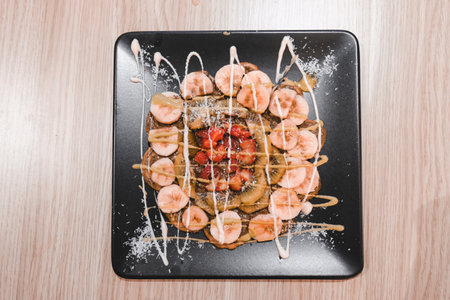 Delicious waffles with chocolate sauceの写真素材