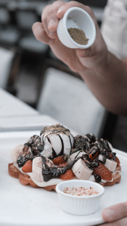 Delicious waffles with chocolate sauceの写真素材