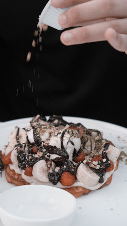 Delicious waffles with chocolate sauceの写真素材