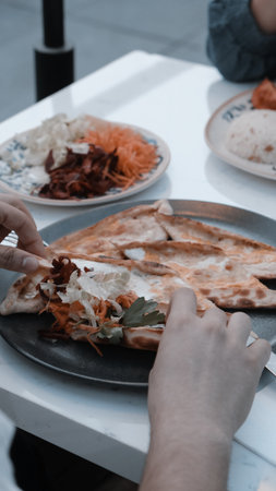 Turkish pizza pita with a different stuffing.の写真素材