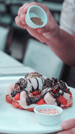 Delicious waffles with chocolate sauceの写真素材