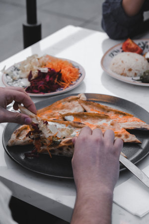 Turkish pizza pita with a different stuffing.の写真素材