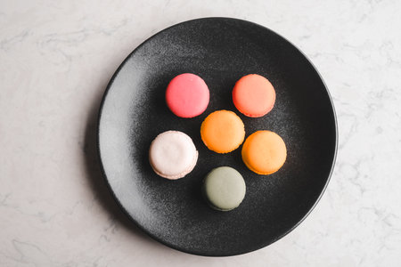 Close-up of macarons cakes of different colorsの写真素材