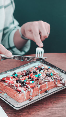 Delicious waffles with chocolate sauceの写真素材