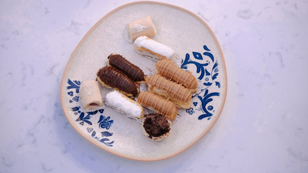 Chocolate dipped eclairs that are impossible to resist
