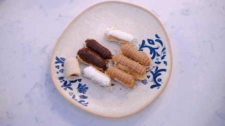 Light and Fluffy French Eclairs with Cream