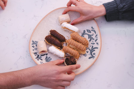 Double Chocolate Eclairs with Crunchy Topping