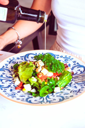 Fresh salad plate with mixed greensの写真素材