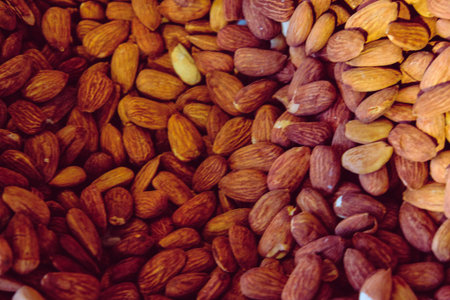 Close up of Almond nuts background. Healthy food concept. Selective focus.