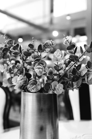 Flowers in a vase on the table. Black and white.の写真素材