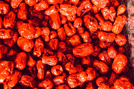 Dried red hot chili pepper as background, closeup of photo