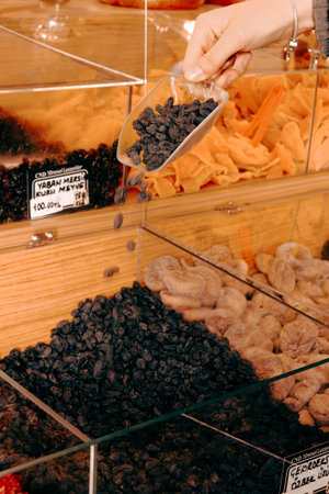 Dried fruits on the counter of a shop in the store.