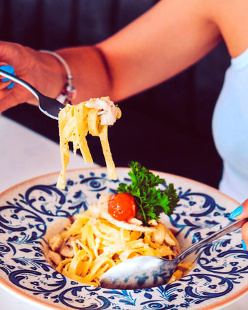 Tasty appetizing classic Italian pasta with a delicious sauce.の写真素材