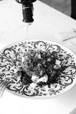 Fresh salad plate with mixed greensの写真素材