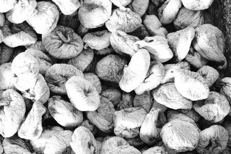 Dried figs in black and white, closeup of photoの写真素材