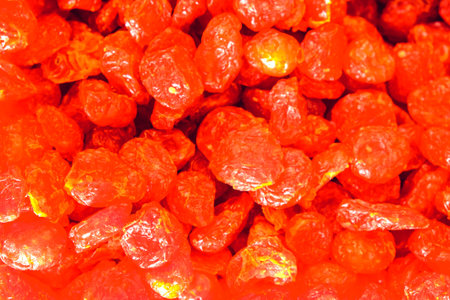 Dried red raisins in a market, closeup of photoの写真素材