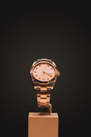 Wrist watch on stand isolated on black background with clipping path.の写真素材