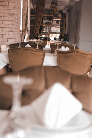 Tables set for an event party or wedding reception in a restaurantの写真素材