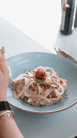 Tasty appetizing classic Italian pasta with a delicious sauce.の写真素材