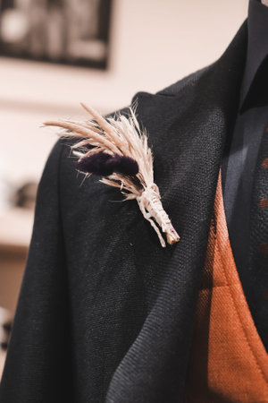 Detail of a mannequin wearing a coat.