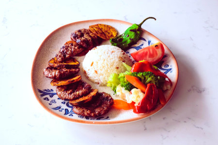 Delicious meatballs with french friesの写真素材