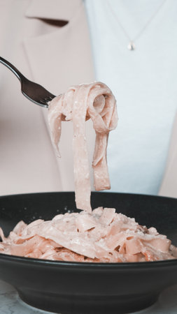 Tasty appetizing classic Italian pasta with a delicious sauce.の写真素材