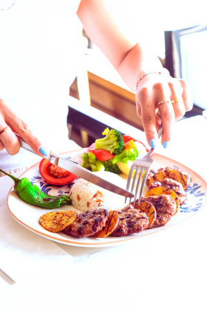 Delicious meatballs with french friesの写真素材