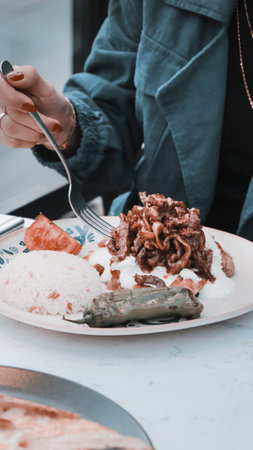 A sizzling hot plate of perfectly cooked meatの写真素材