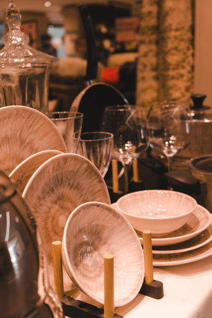 Close up view of a table set for dinner in a restaurant.の写真素材