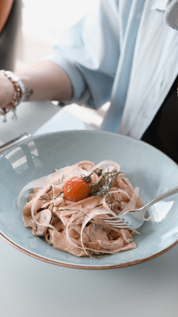 Tasty appetizing classic Italian pasta with a delicious sauce.の写真素材