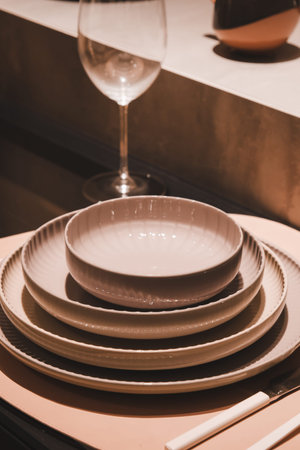 empty plate and glass on table in restaurant - vintage effect style pictures