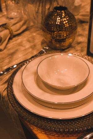 Close up of elegant table setting. Selective focus. Toned.の写真素材