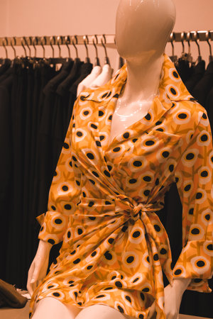 Women's clothing on a mannequin in a fashion store.の写真素材