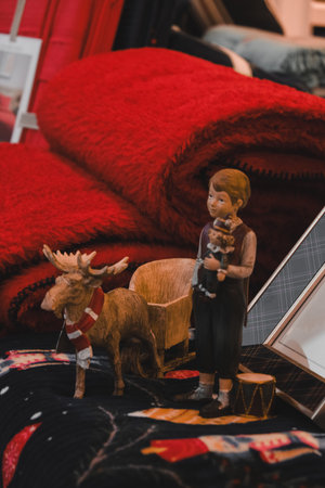 Wooden toys of a deer and a girl in the store.の写真素材
