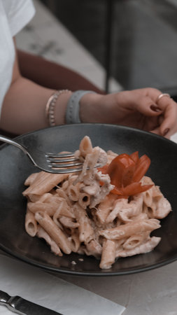 Tasty appetizing classic Italian pasta with a delicious sauce.の写真素材