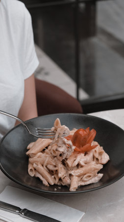 Tasty appetizing classic Italian pasta with a delicious sauce.の写真素材