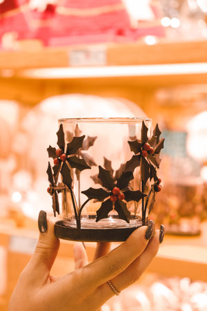 Holly leaves in a glass on christmas market, stock photoの写真素材