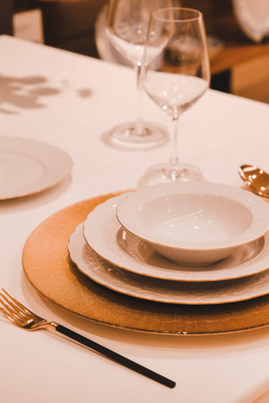 Table setting in a restaurant. Selective focus. Toned.の写真素材